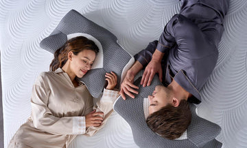A couple are sleeping on Elviros memory foam series products.