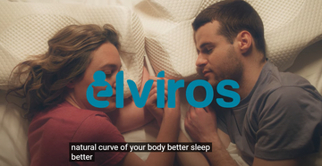 A couple is sleeping on Elviros elviros cervical memory foam pillow
